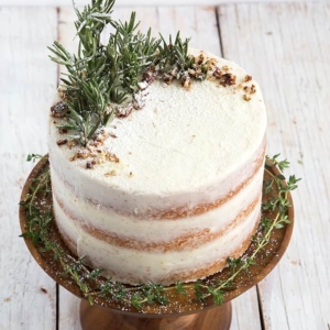 Rosemary Lemon Cake garnished with fresh rosemary