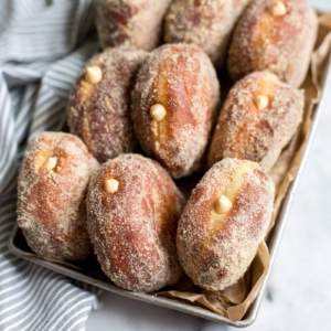 fried doughnuts filled with pumpkin cheesecake.