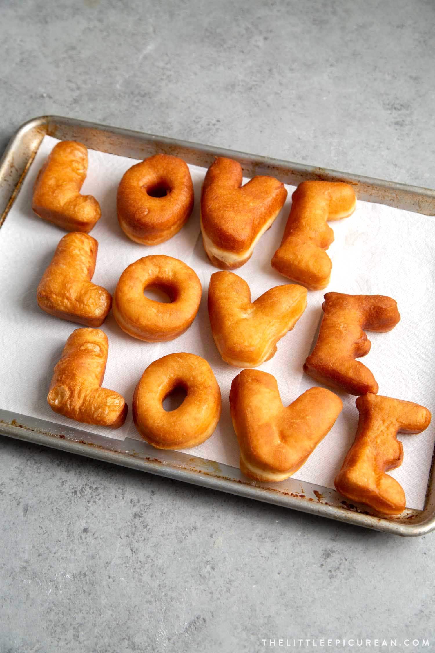Glazed Letter Donuts with Sprinkles - The Little Epicurean