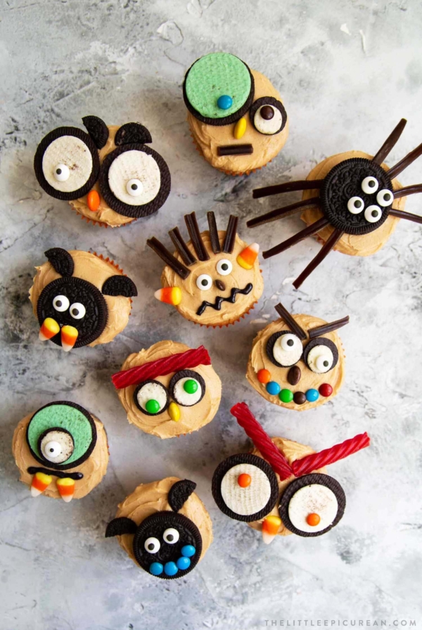 Easy to decorate Halloween cupcakes using a variety of store-bought cookies and candies. Use your favorite cupcake recipe, or try the peanut butter cupcakes with peanut butter frosting in this post.