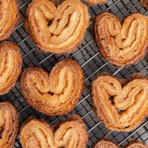 Cinnamon Sugar Palmier. These crispy mini cookies are made with puff pastry. They're super easy to assemble! #palmier #cookies #cinnamonsugar #easyrecipe #dessert