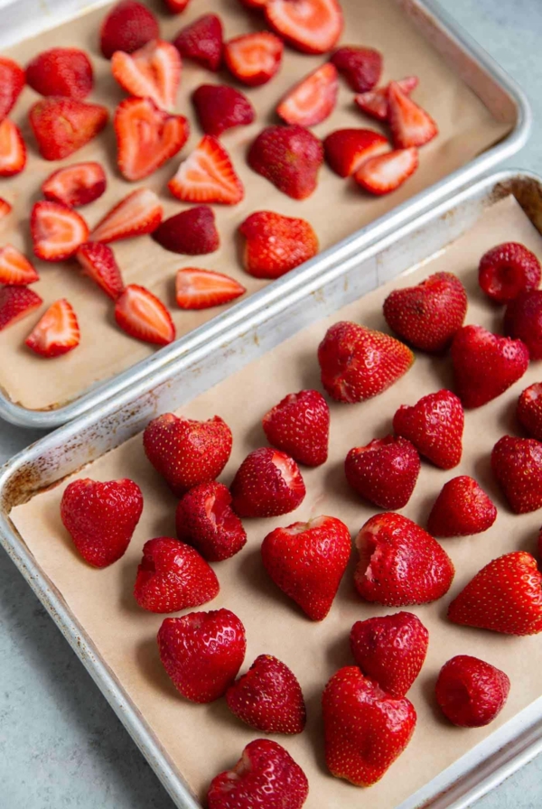 Place hulled strawberries on sheet tray