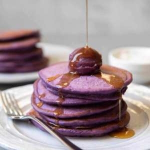 ube pancakes with ube halaya and maple syrup