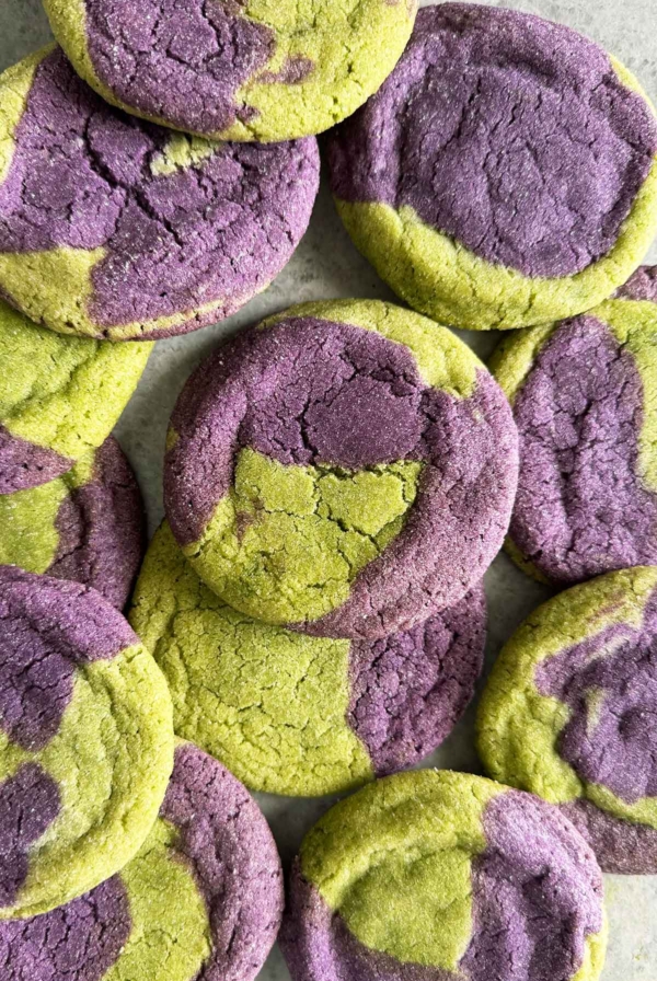 matcha ube sugar cookies layered on top each other.